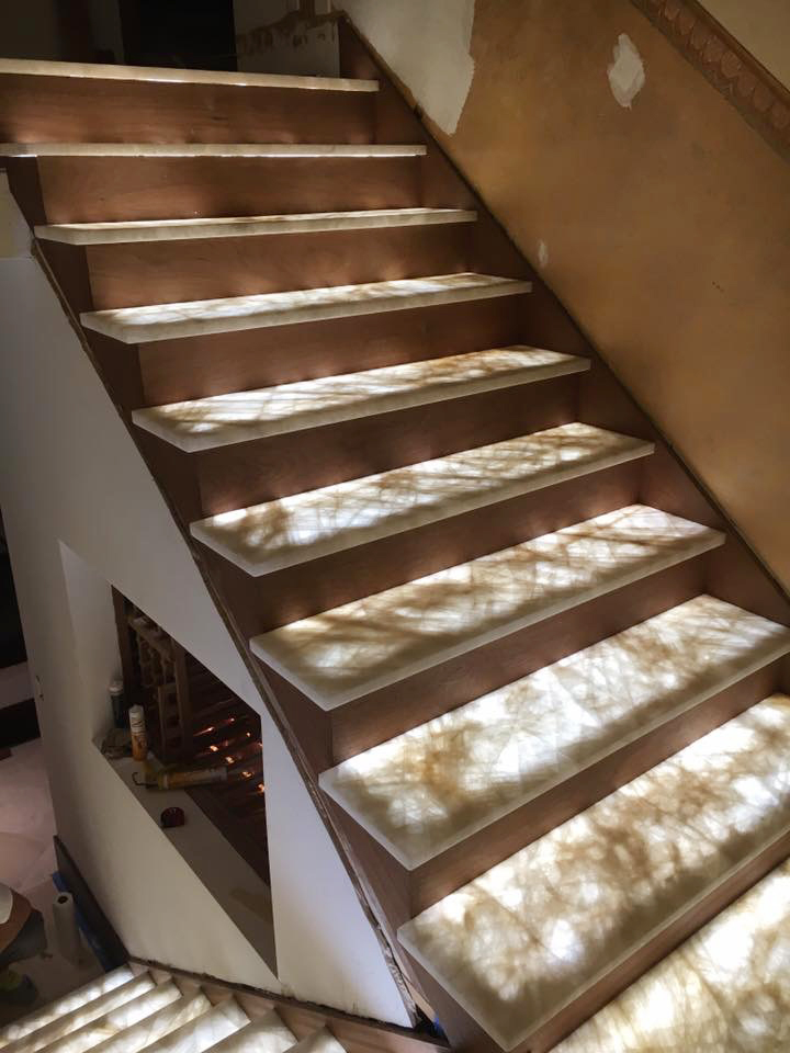 custom made stairs with granite countertops